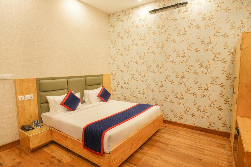 Postel nebo postele na pokoji v ubytování Zip By Spree Hotels Bella Heights Mcleodganj