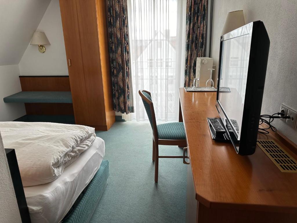 Postel nebo postele na pokoji v ubytování ST Hotel