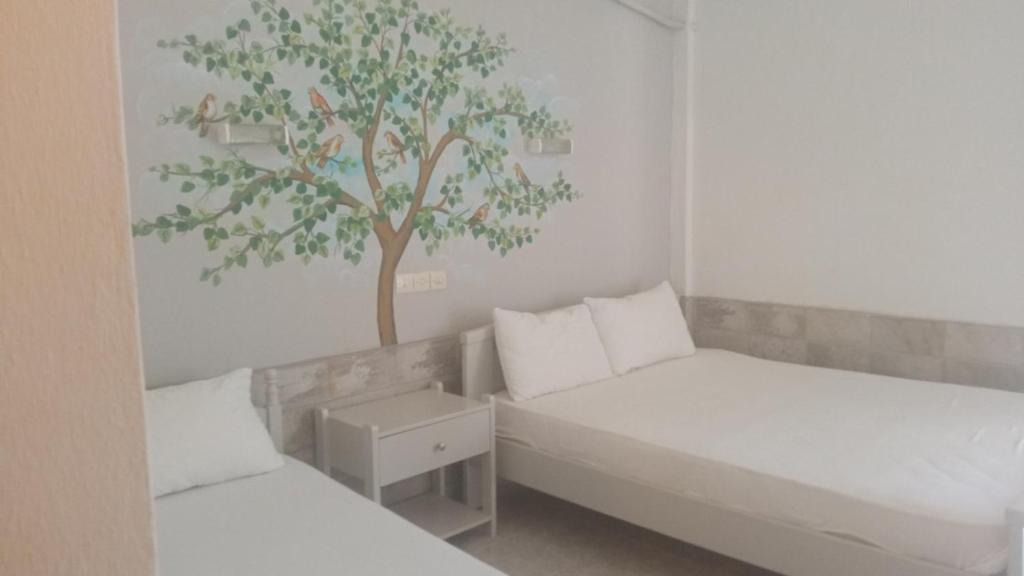 מיטה או מיטות בחדר ב-Villa Veneti
