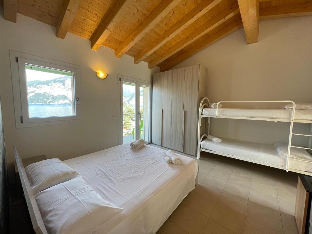 Postel nebo postele na pokoji v ubytování Camping Antonio