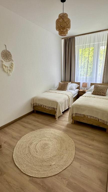 Postel nebo postele na pokoji v ubytování Villa Antara