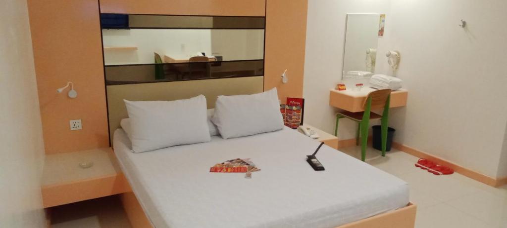 Postel nebo postele na pokoji v ubytování Hotel Sogo Buendia