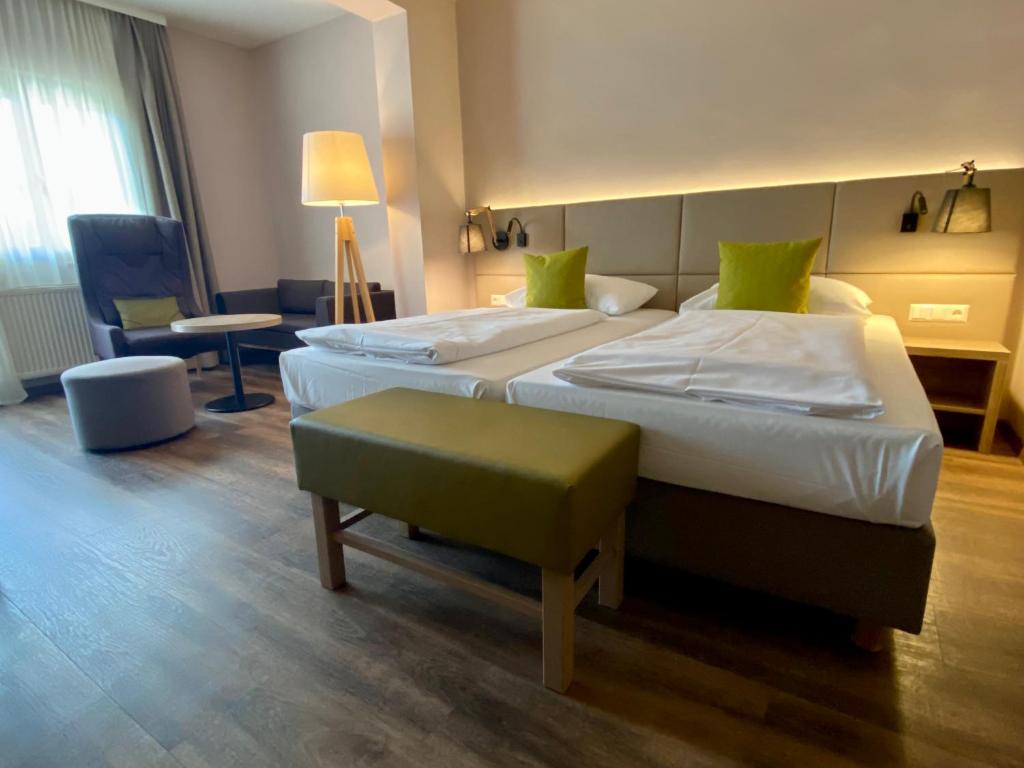 Postel nebo postele na pokoji v ubytování Simon - das Vitalhotel