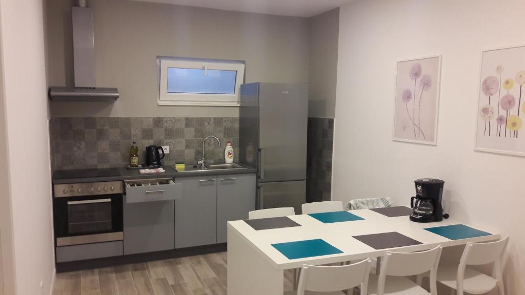 Kuchyň nebo kuchyňský kout v ubytování Rooms Bruno