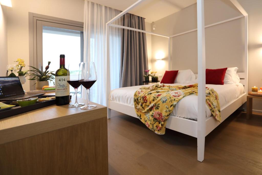 Postel nebo postele na pokoji v ubytování Agriturismo Le Piccole Macìe
