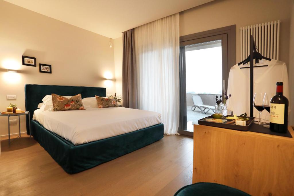 Postel nebo postele na pokoji v ubytování Agriturismo Le Piccole Macìe