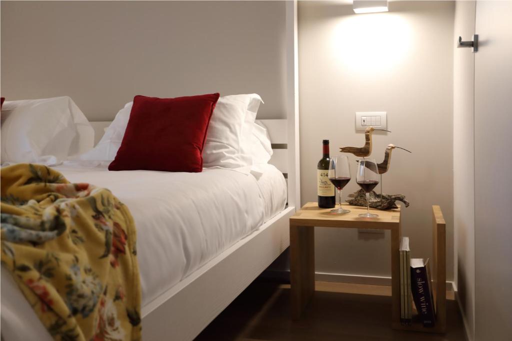 Postel nebo postele na pokoji v ubytování Agriturismo Le Piccole Macìe