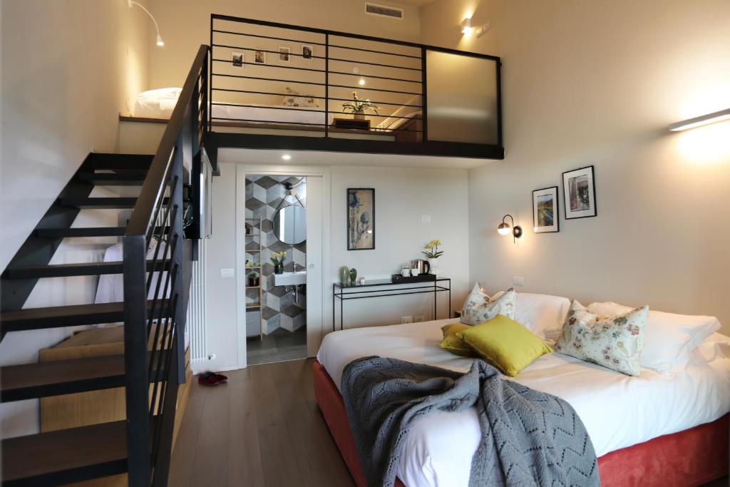 Postel nebo postele na pokoji v ubytování Agriturismo Le Piccole Macìe