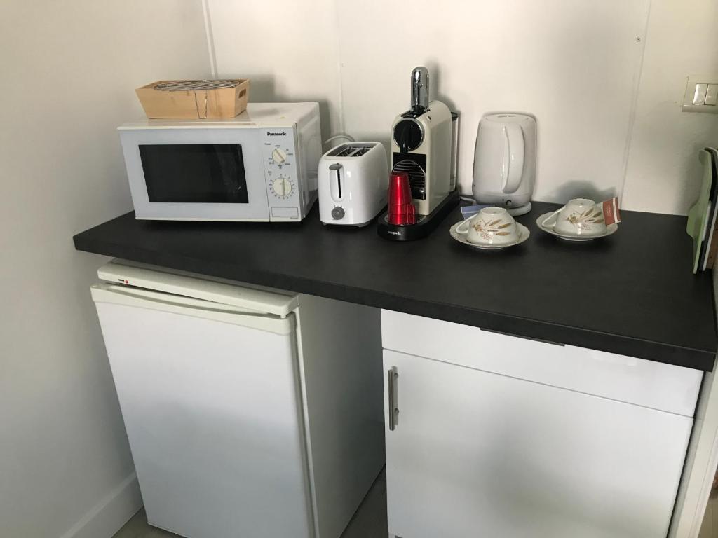 Kuchyň nebo kuchyňský kout v ubytování La Maison des Vignes