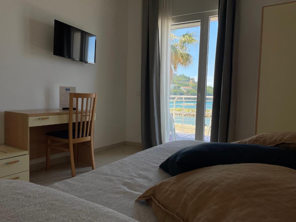 Postel nebo postele na pokoji v ubytování Hotel Mare