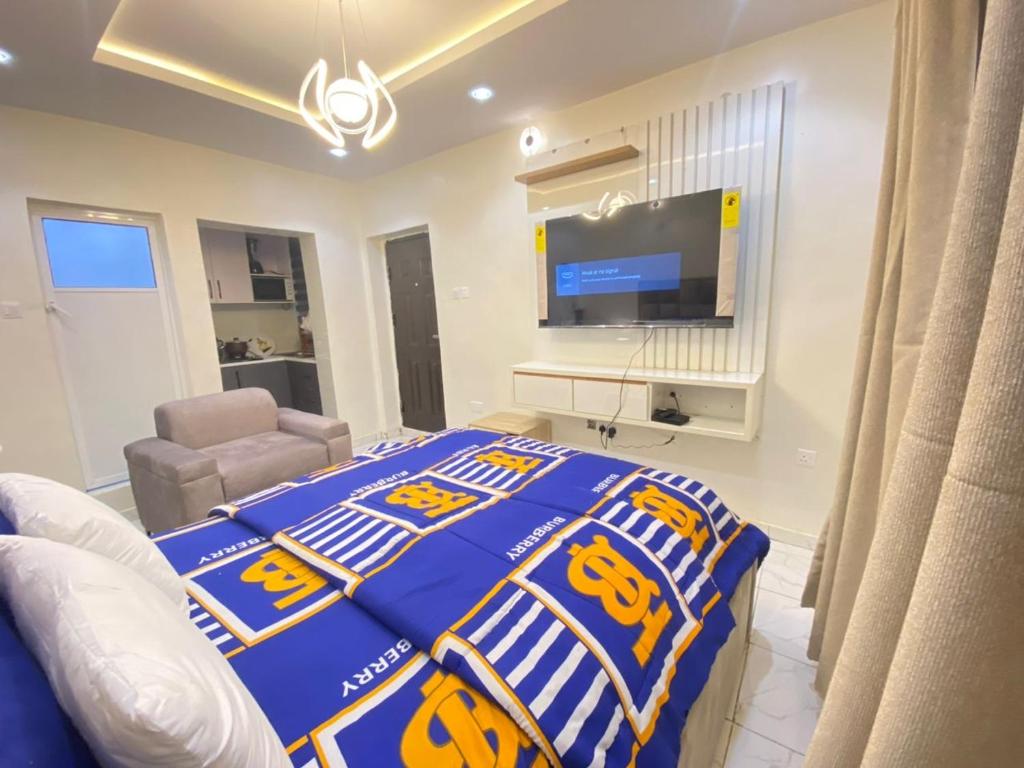מיטה או מיטות בחדר ב-Smart studio apartment yaba onike
