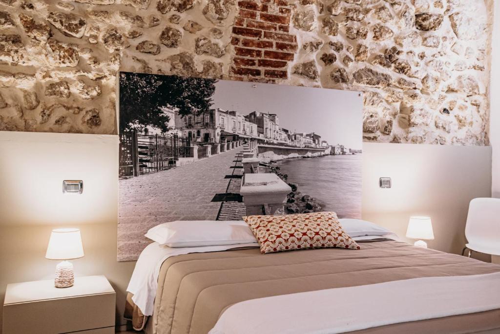 Postel nebo postele na pokoji v ubytování B&B Vicolo IV