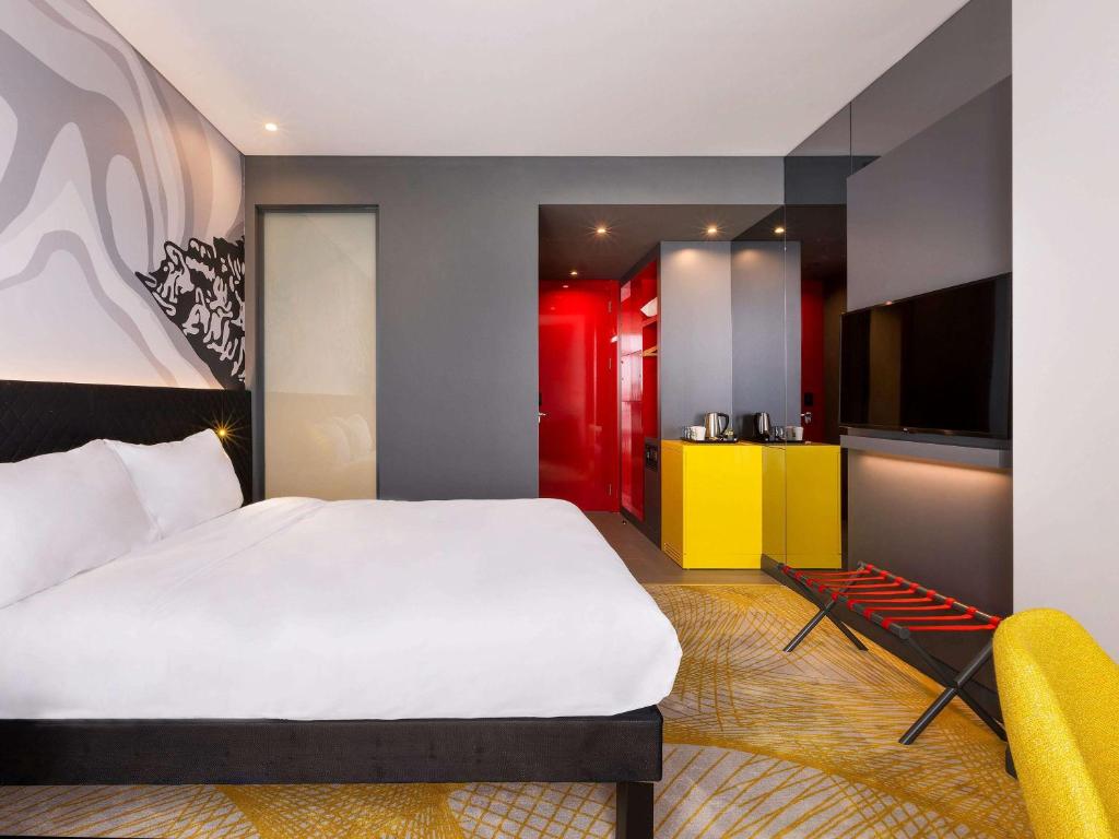 A bed or beds in a room at ibis Styles Istanbul Merter
