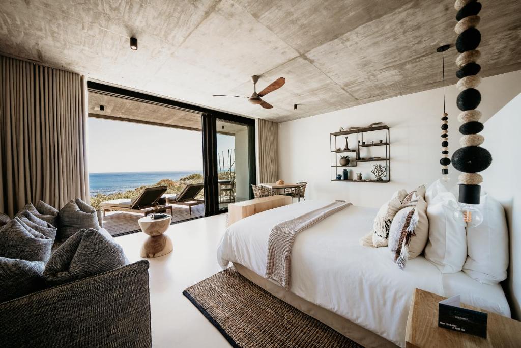 Letto o letti in una camera di Pure Sea Boutique Lodge