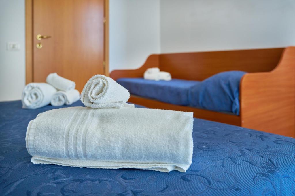 Postel nebo postele na pokoji v ubytování Nuovo hotel ANTHISA