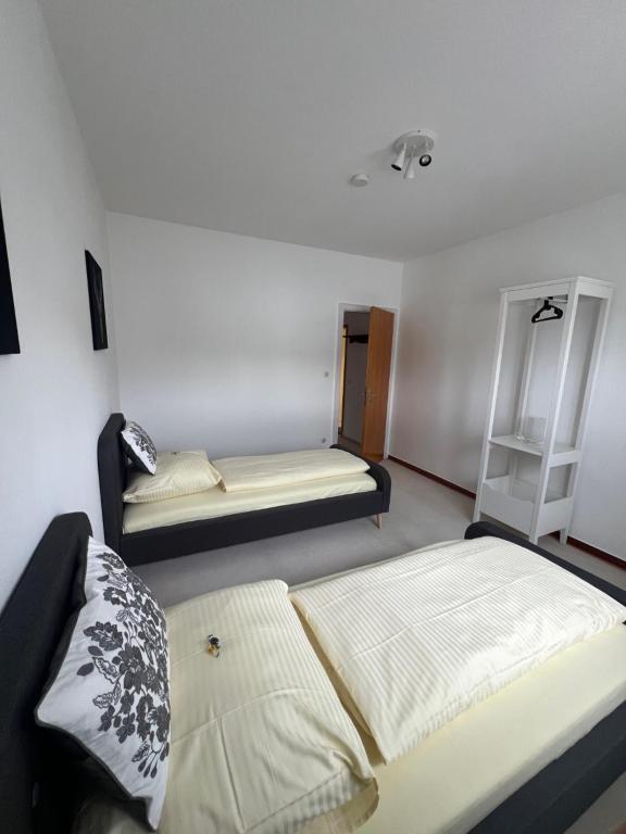 Postel nebo postele na pokoji v ubytování Sonnenhof