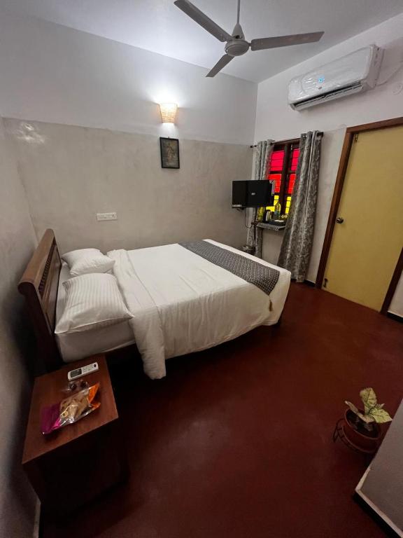 Postel nebo postele na pokoji v ubytování Villa Vedapuri