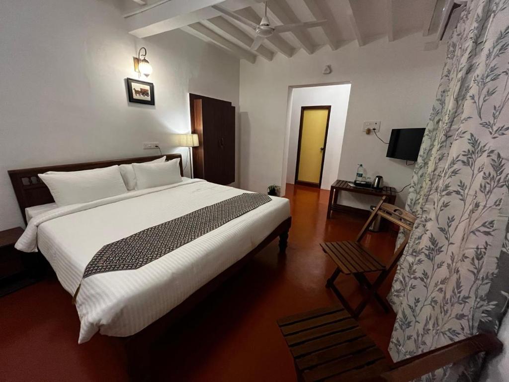 Postel nebo postele na pokoji v ubytování Villa Vedapuri