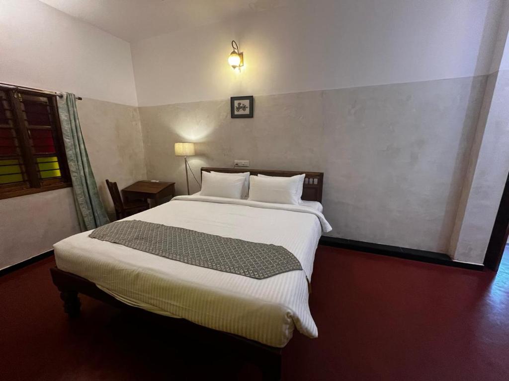 Postel nebo postele na pokoji v ubytování Villa Vedapuri