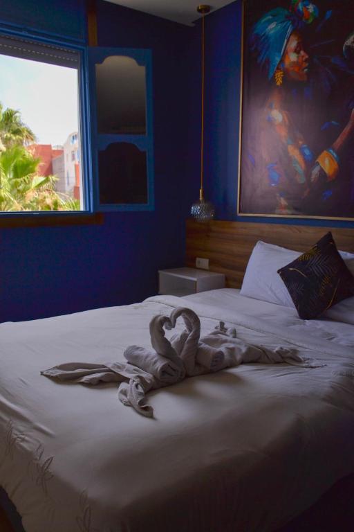 Posteľ alebo postele v izbe v ubytovaní Playa Del Sol Surf House