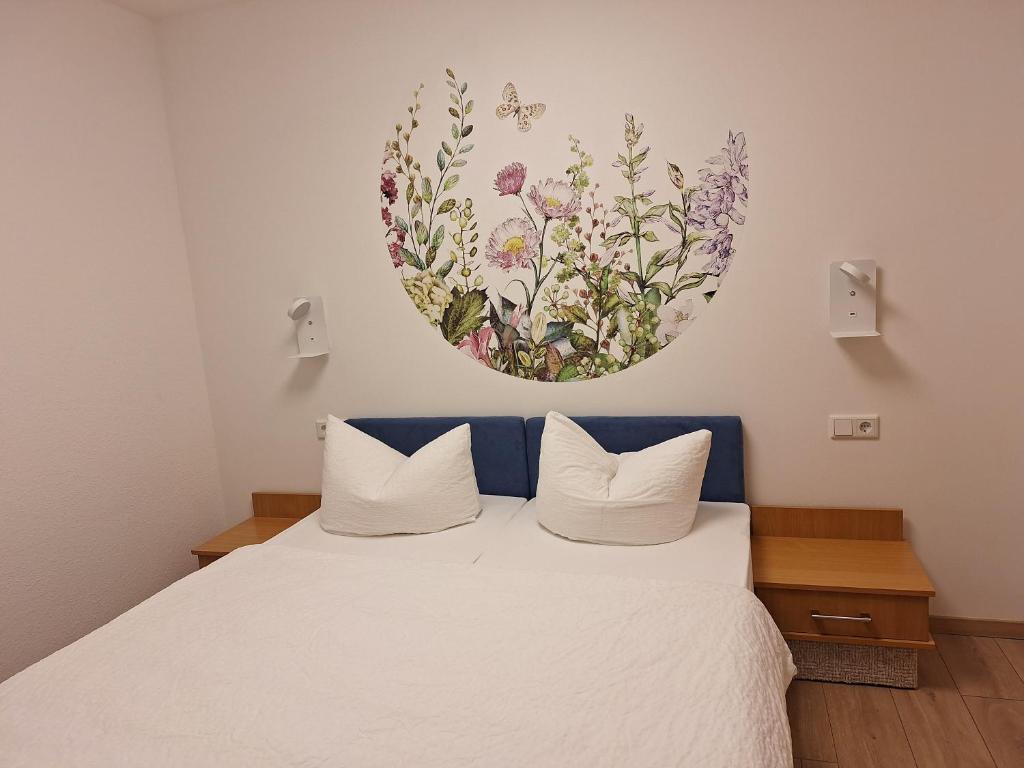 Postel nebo postele na pokoji v ubytování Hotel am Schloss