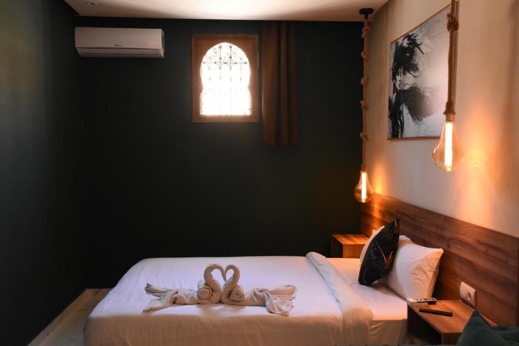 Posteľ alebo postele v izbe v ubytovaní Playa Del Sol Surf House