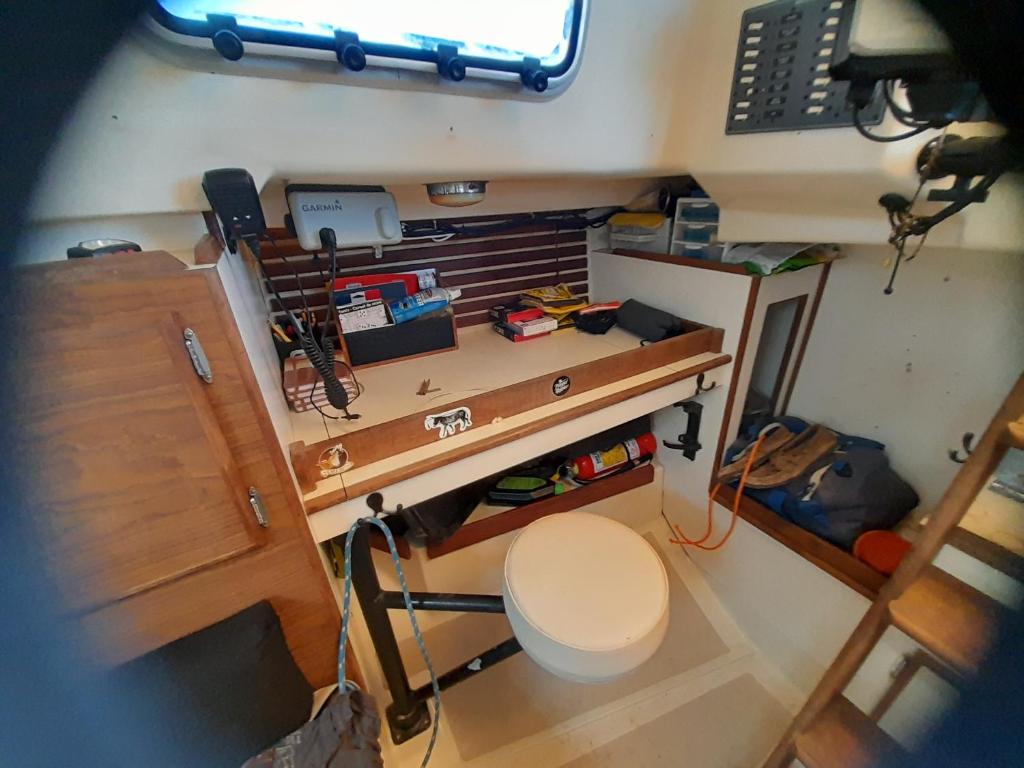 an overhead view of a small room with a toilet at Sailboat Nika, Tilly's Sail Tours in Siaton