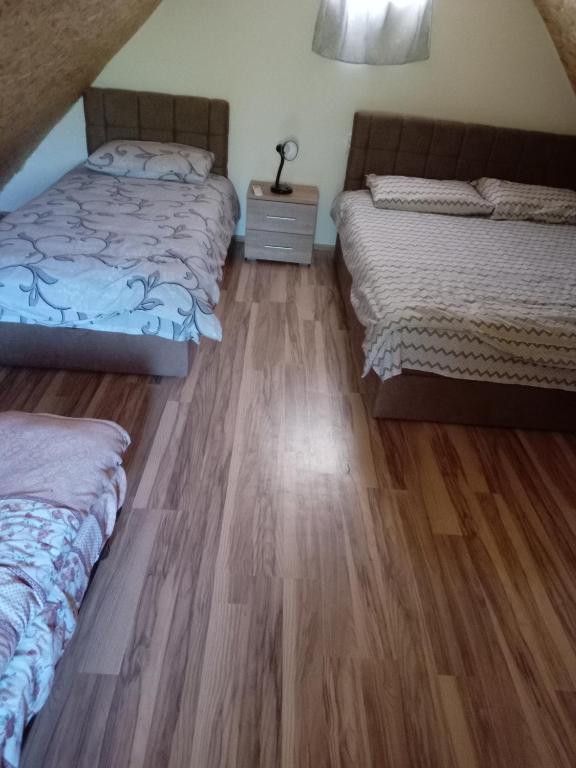 Voodi või voodid majutusasutuse Vila Viktori toas