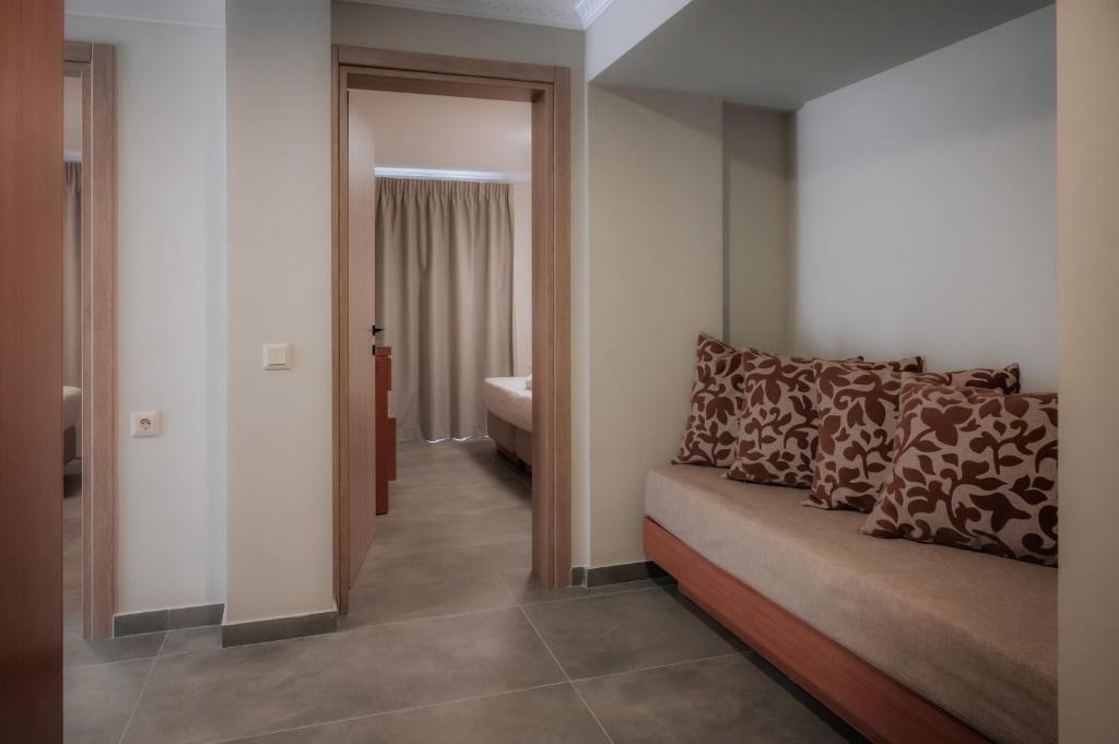 Postel nebo postele na pokoji v ubytování Hotel Hermes Pieria