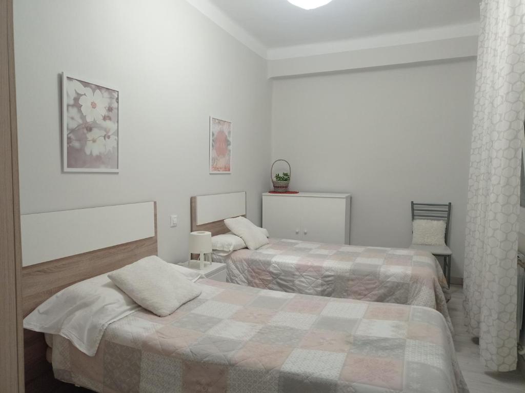 Posteľ alebo postele v izbe v ubytovaní Barrón 21