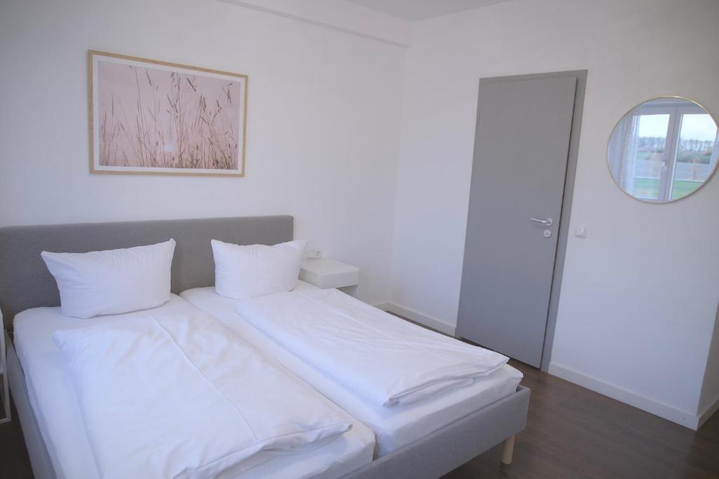 Postel nebo postele na pokoji v ubytování Hotel & Gasthof Wagner