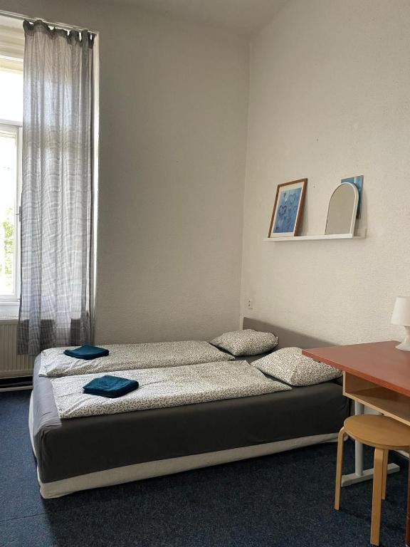Postel nebo postele na pokoji v ubytování Hostel Moravia Ostrava
