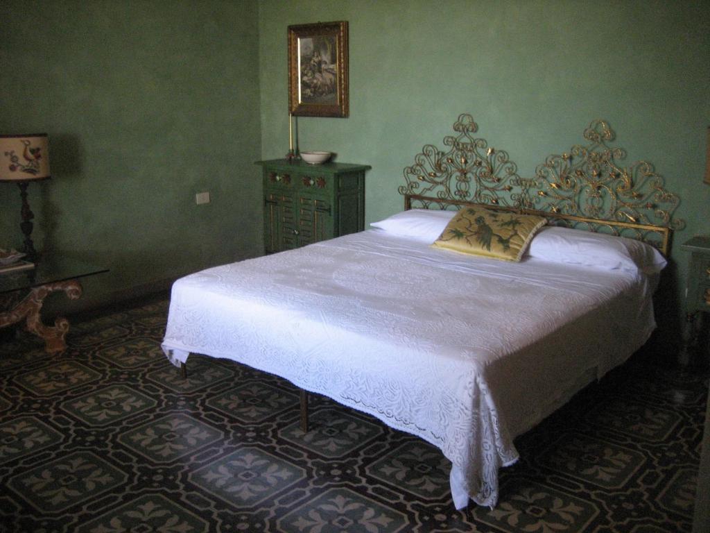 Posteľ alebo postele v izbe v ubytovaní B&B Villa Panicucci