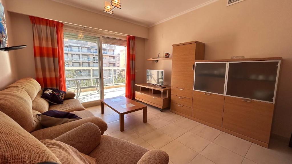 TV a/nebo společenská místnost v ubytování Apartamento Playa de Daimuz