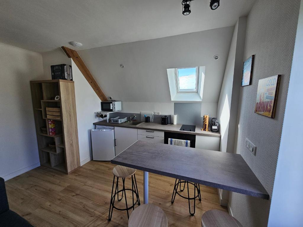 Kuchyň nebo kuchyňský kout v ubytování Le Faouët Appartement