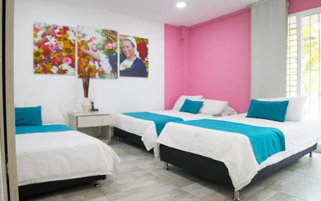 Postel nebo postele na pokoji v ubytování Almaviva Casa Hotel
