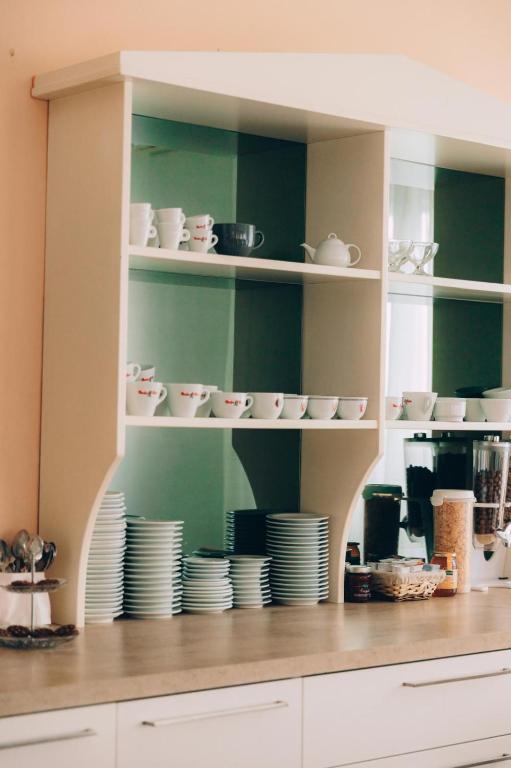 Kuchyň nebo kuchyňský kout v ubytování Hotel Enna Rimini
