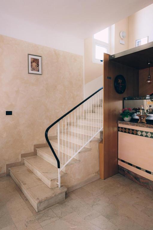 Kuchyň nebo kuchyňský kout v ubytování Hotel Enna Rimini