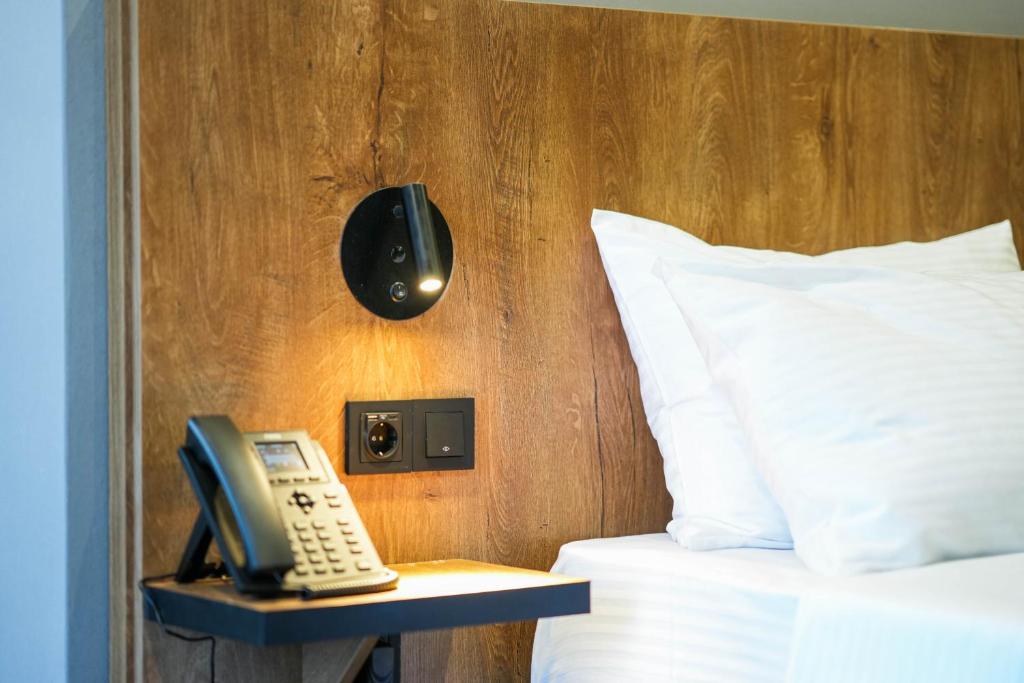 Postel nebo postele na pokoji v ubytování Hotel Splendid Tbilisi