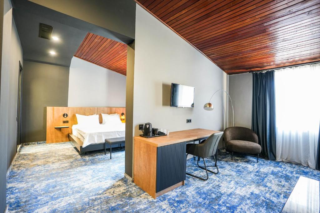 Postel nebo postele na pokoji v ubytování Hotel Splendid Tbilisi