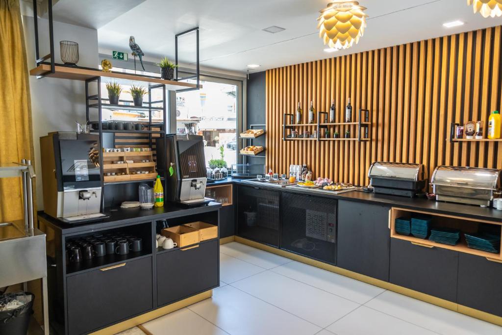Kuchyň nebo kuchyňský kout v ubytování Hotel Plzeň