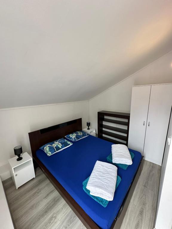 Postel nebo postele na pokoji v ubytování Etno village Mihailovic III
