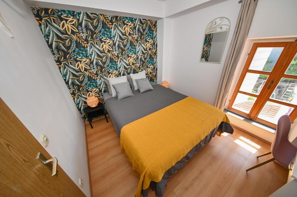 Posteľ alebo postele v izbe v ubytovaní The Lazy Monkey Hostel & Apartments