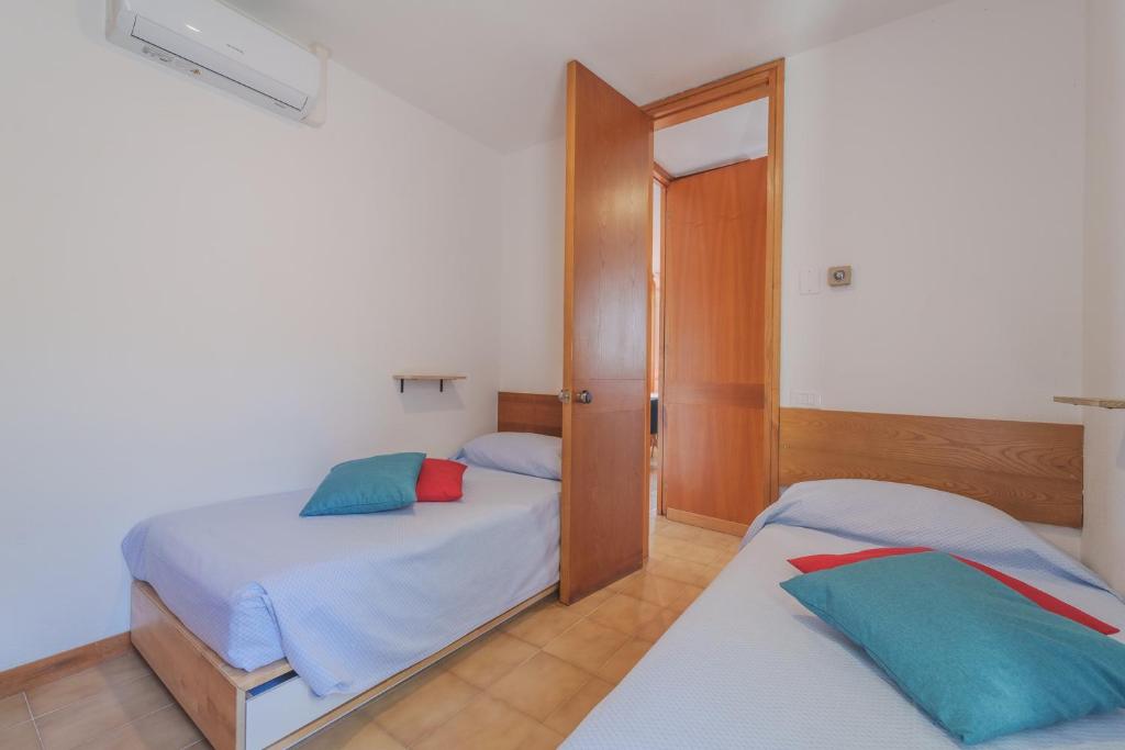 Postel nebo postele na pokoji v ubytování Casa William - Villa e 2 Dependance