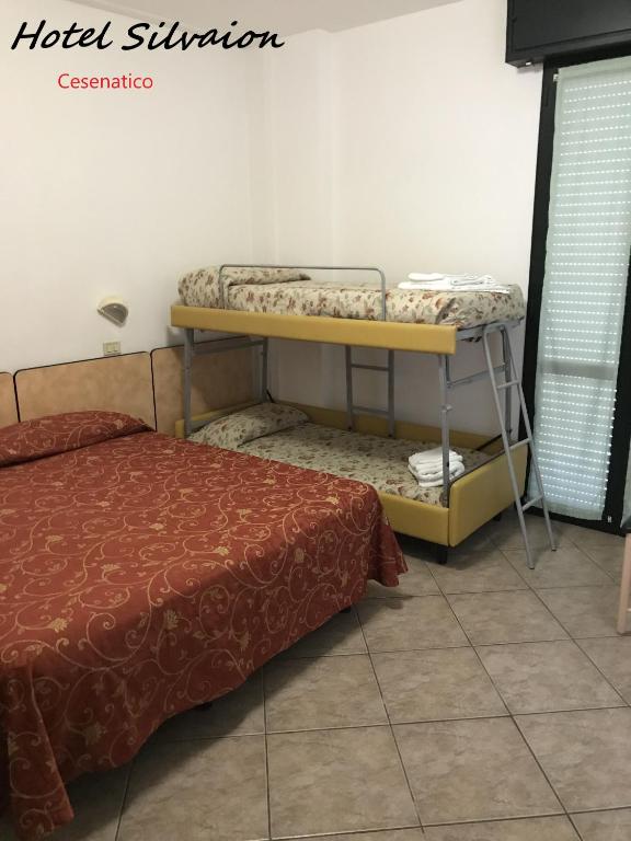 Postel nebo postele na pokoji v ubytování Hotel Silvaion