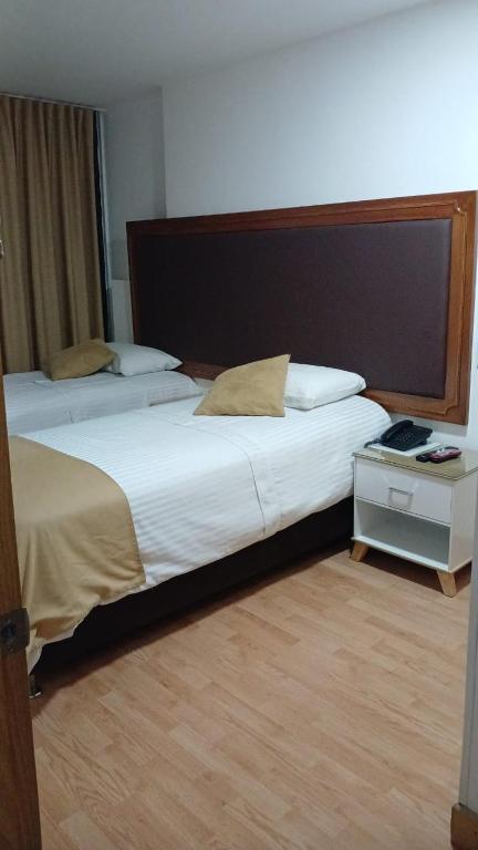 Postel nebo postele na pokoji v ubytování Hotel Dorado Ferial
