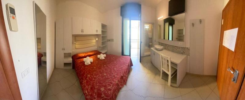 Postel nebo postele na pokoji v ubytování Hotel Silvaion