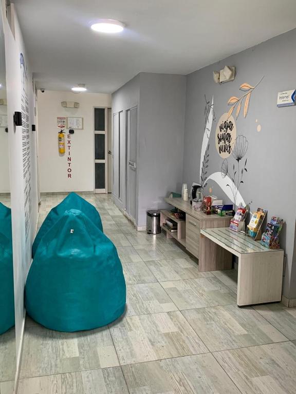 Posezení v ubytování Almaviva Casa Hotel