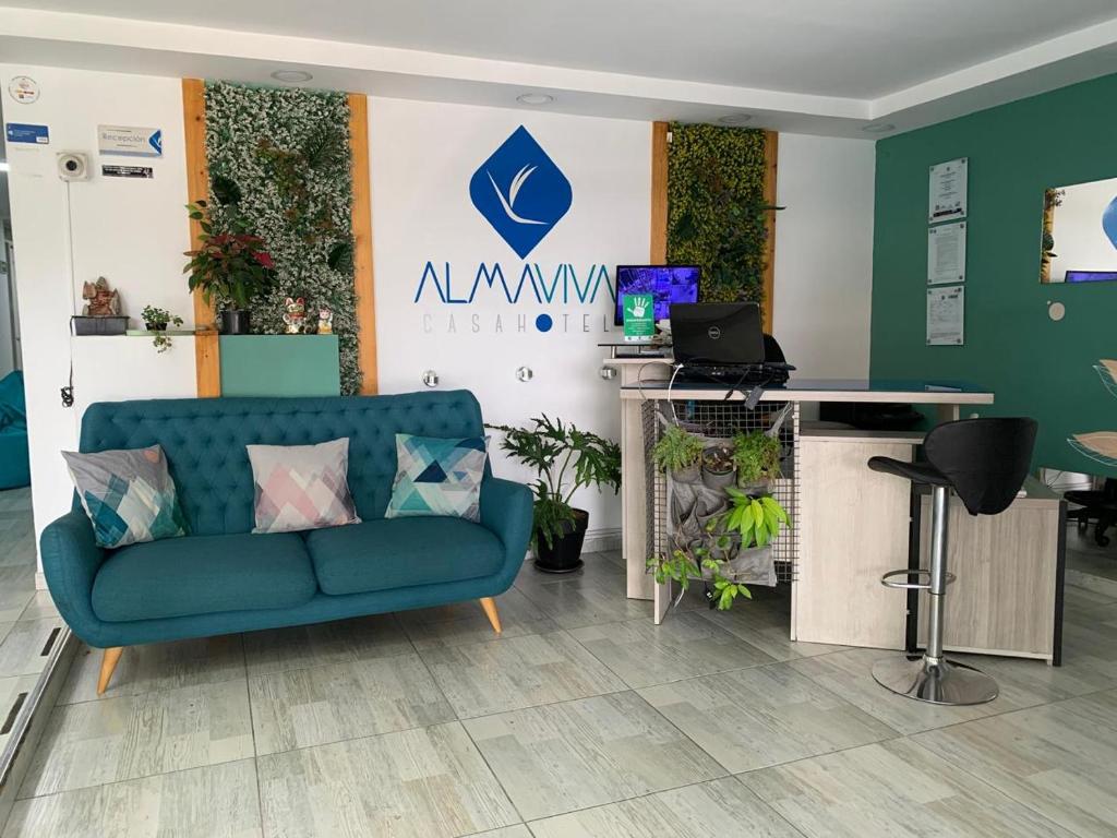TV a/nebo společenská místnost v ubytování Almaviva Casa Hotel