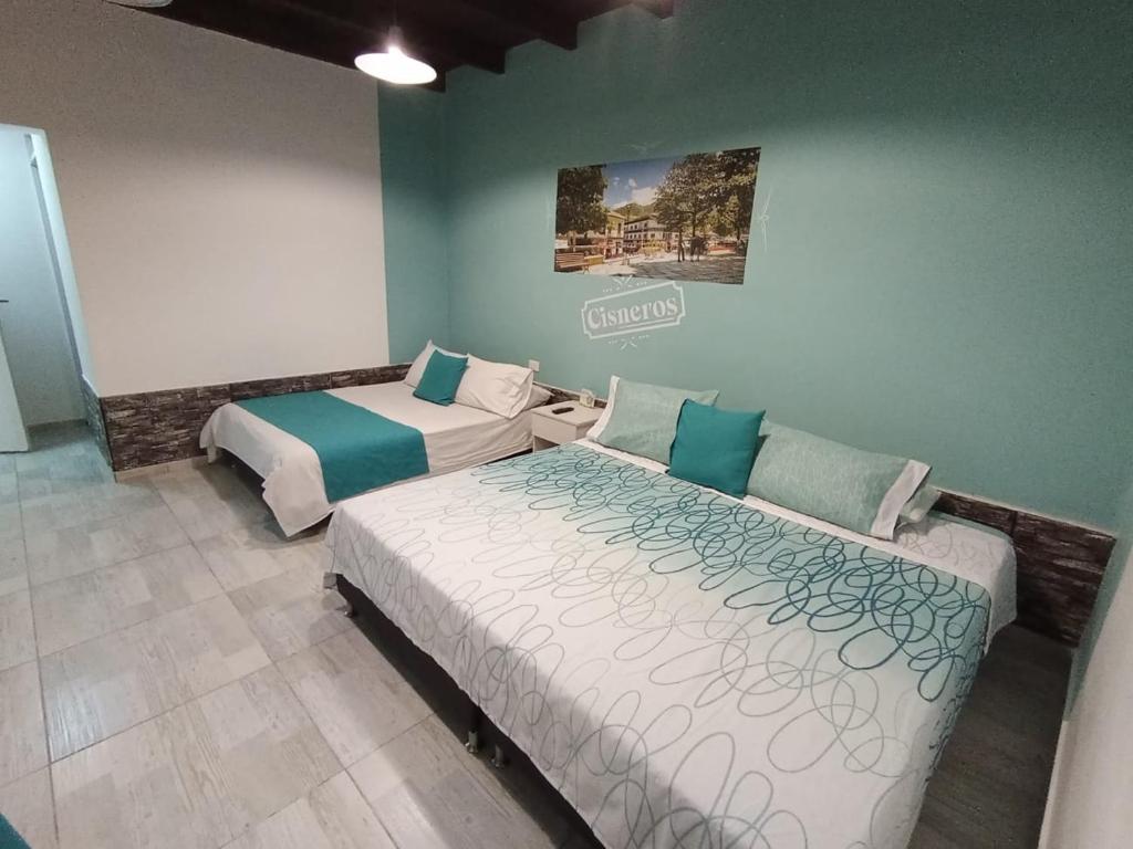Postel nebo postele na pokoji v ubytování Almaviva Casa Hotel
